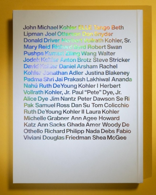 back cover of book with contributors' names set side by side in helvetica and printed with holographic foil